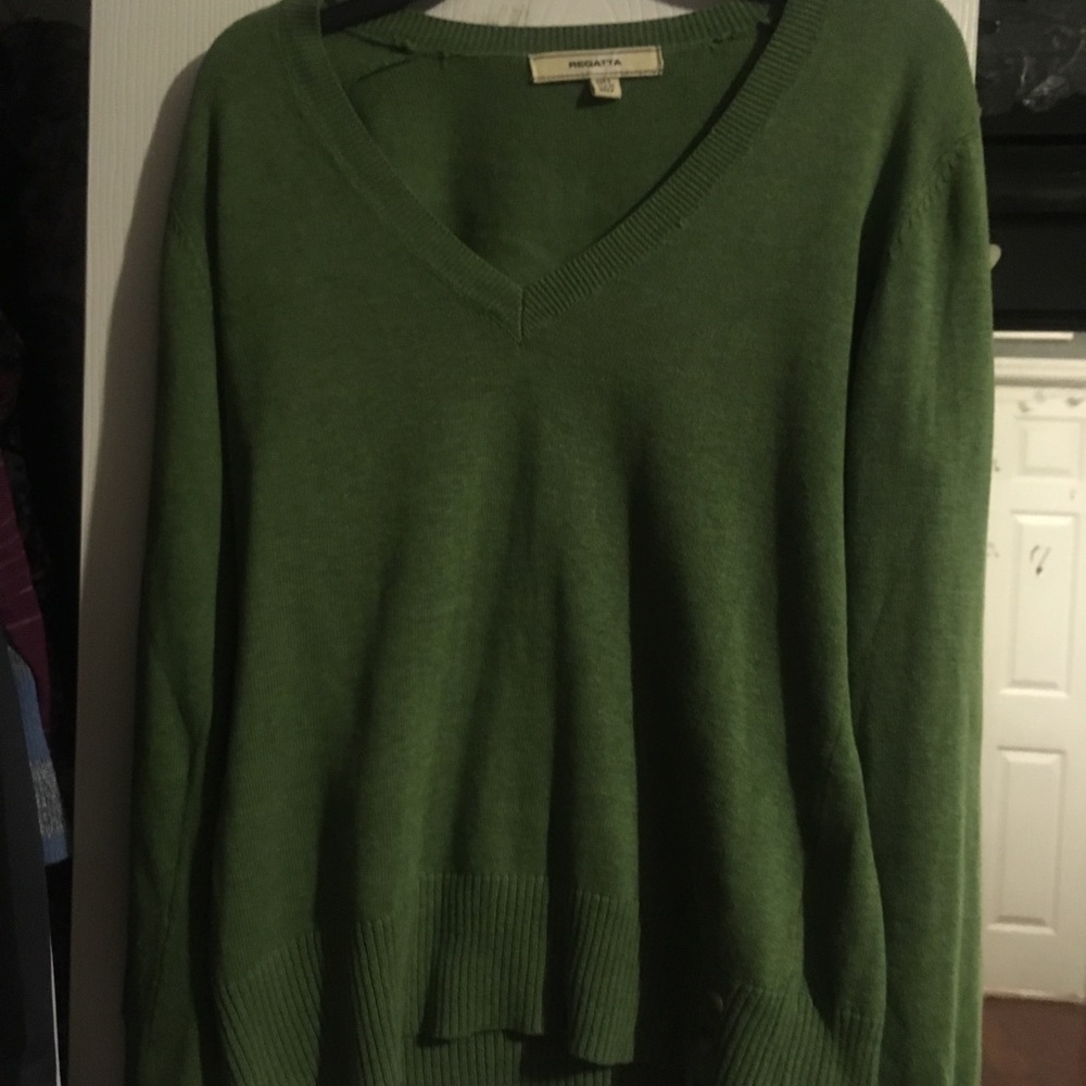 Green sweater with buttons on sleeves